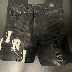 AMIRI Black Distressed Skinny Jeans